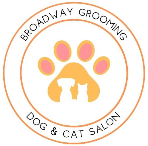 Broadway Grooming in Mesa Arizona. Dog and cat salon. Pink, orange, and yellow logo with puppy and cat in a paw print.